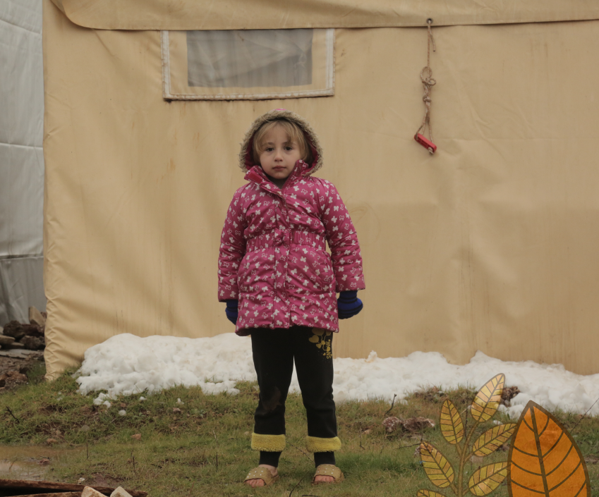 Child standing outside a shelter in winter